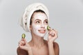 young woman with facial skincare mask and cucumber slices Royalty Free Stock Photo