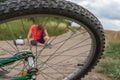 Young woman fallen from mountain bicycle Royalty Free Stock Photo