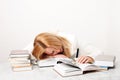 Young woman falling asleep while studying Royalty Free Stock Photo