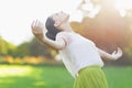 Young woman falling on meadow Royalty Free Stock Photo