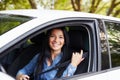 Young woman fasten seat belt in her car Royalty Free Stock Photo