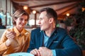 Young woman feeding man with a spoon Royalty Free Stock Photo