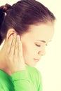 Young woman feeling a pain in ear Royalty Free Stock Photo