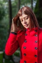 Young woman feeling sad walking on a forest Royalty Free Stock Photo