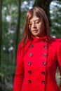 Young woman feeling sad walking on a forest Royalty Free Stock Photo