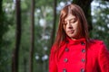 Young woman feeling sad walking on a forest Royalty Free Stock Photo