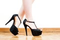 Young woman feet with black high heels and legs Royalty Free Stock Photo