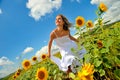 Young woman on field in summer Royalty Free Stock Photo