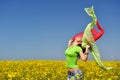 Young woman on field in summer Royalty Free Stock Photo