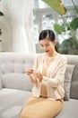 Young woman filing her nails, smiling Royalty Free Stock Photo