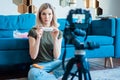 Young woman filming video blog on camera, blogger influencer profession concept Royalty Free Stock Photo