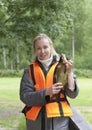 The young woman the fisherman with caught the bream