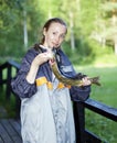 The young woman the fisherman with the caught pike