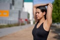 Young woman with fit body doing muscle stretches Royalty Free Stock Photo