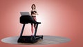 A young woman in fitness clothes is running on a treadmill. 3d illustration Royalty Free Stock Photo