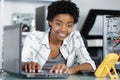 Young woman fix pc component in service center Royalty Free Stock Photo