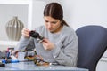 Young woman fix pc component in service center Royalty Free Stock Photo