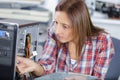 young woman fix pc component in service center Royalty Free Stock Photo