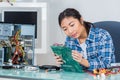Young woman fixing computer motherboard Royalty Free Stock Photo