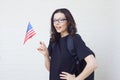 Young woman with the flag of the United States of America.