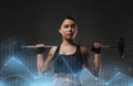 Young woman flexing muscles with barbell in gym Royalty Free Stock Photo