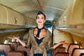 Young woman in flight attendant clothes. Happy smiling woman stewardess in uniform waiting for her flight. Stewardess Royalty Free Stock Photo