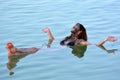 Young Woman floating on the Dead Sea, Israel Royalty Free Stock Photo