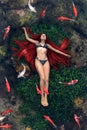 Young woman floating in water Royalty Free Stock Photo