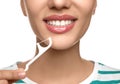 Young woman flossing her teeth on white background, closeup. Cosmetic dentistry Royalty Free Stock Photo