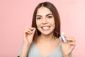 Young woman flossing teeth Royalty Free Stock Photo