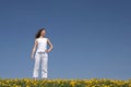 Young woman in flowering field