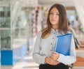 Young woman with folder. Royalty Free Stock Photo