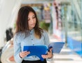 Young woman with folder. Royalty Free Stock Photo