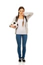 Young woman with foot ball. Royalty Free Stock Photo
