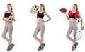 The young woman with football, rugby ball, boxing gloves and tennis racquet Royalty Free Stock Photo