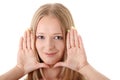 Young woman frame her face with hands Royalty Free Stock Photo