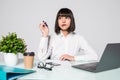 Young woman freelancer female hands with pen writing on notebook in office Royalty Free Stock Photo