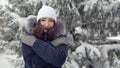 Young woman freezes for a walk in the forest Royalty Free Stock Photo