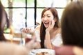 Woman with friends having dinner in the restaurant Royalty Free Stock Photo