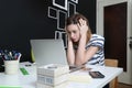 Young woman in front of laptop Royalty Free Stock Photo