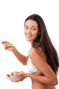 Young woman with fruit bowl. Royalty Free Stock Photo