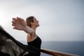 Portrait of a beautiful young tourist in a cruise trip in the Mediterranean sea