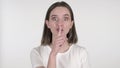 Young Woman Gesturing Silence, Finger on Lips Royalty Free Stock Photo