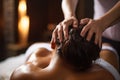 Young woman getting a back massage in a spa salon. Beauty treatment concept, Close up of a woman receiving back massage at spa, AI Royalty Free Stock Photo