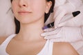 Young woman getting facial skincare treatment