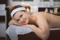 Young woman getting lastone therapy in spa Royalty Free Stock Photo