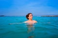 Young woman girl bath in the Ibiza beach Royalty Free Stock Photo