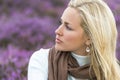 Young Woman Girl in Field of Purple Heather Flowers