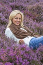 Young Woman Girl in Field of Purple Heather Flowers