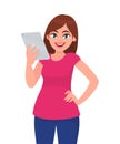 Young woman or girl holding a digital tablet computer in hand. Person using a gadget device. Female character design illustration.